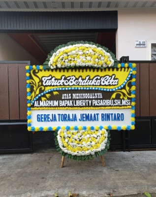 Papan Bunga Duka di Montong Gamang